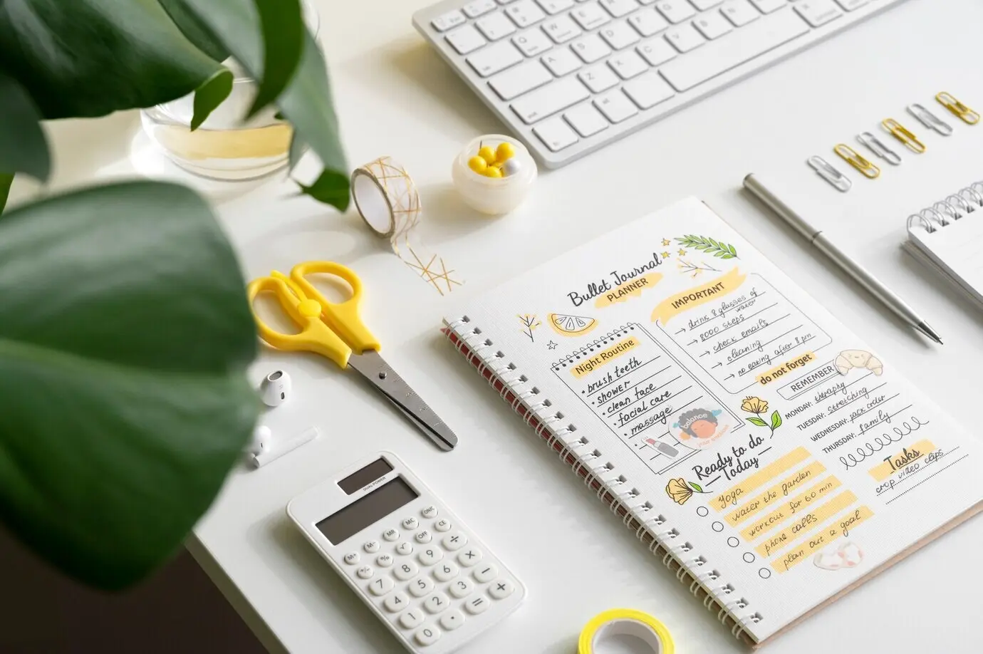 A still life featuring a colorful, jam-packed bullet journal.