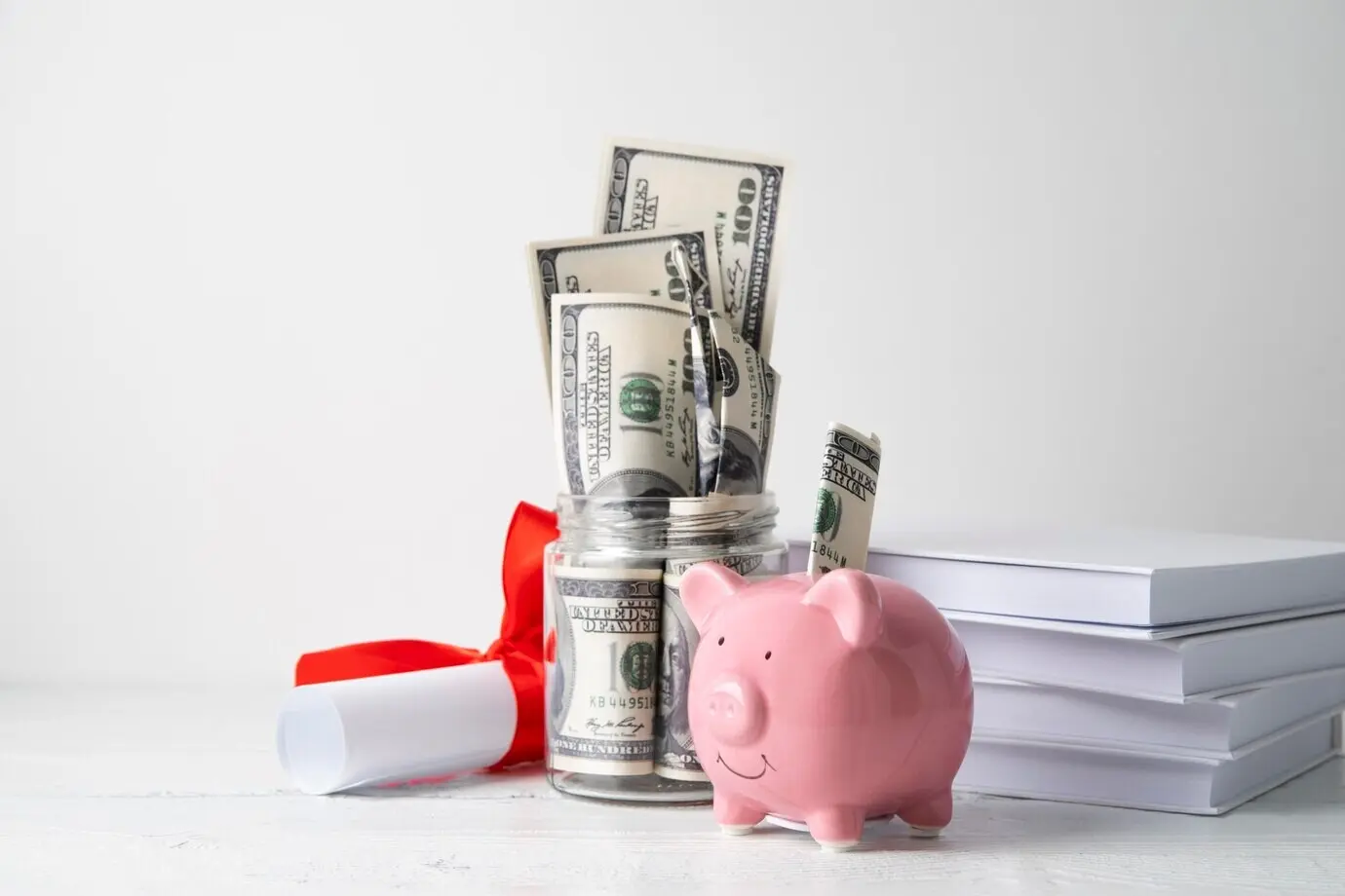 Close-up of items related to education and the economy.